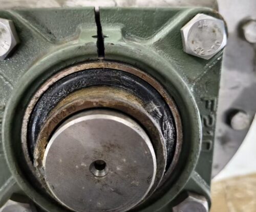 Overloaded pillow block bearing showing damage