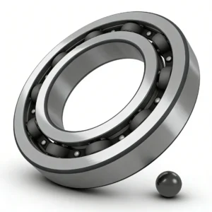 Close-up of a steel ball bearing with an inner ring, outer ring, and bearings visible, alongside a separate ball on a white background.